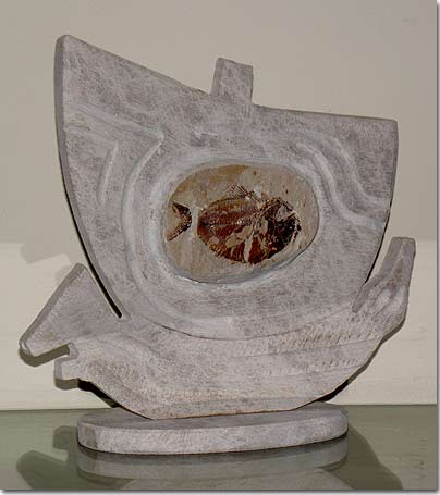 Sculpted stone bas-relief with fossils