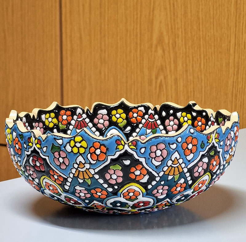 Painted bowls and plates of Persian Iranian ceramic pottery enamel
