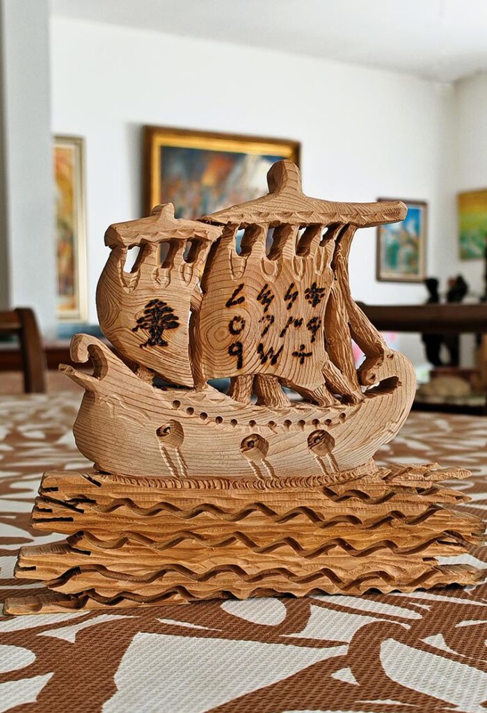 Phoenician ship sculpture in wood